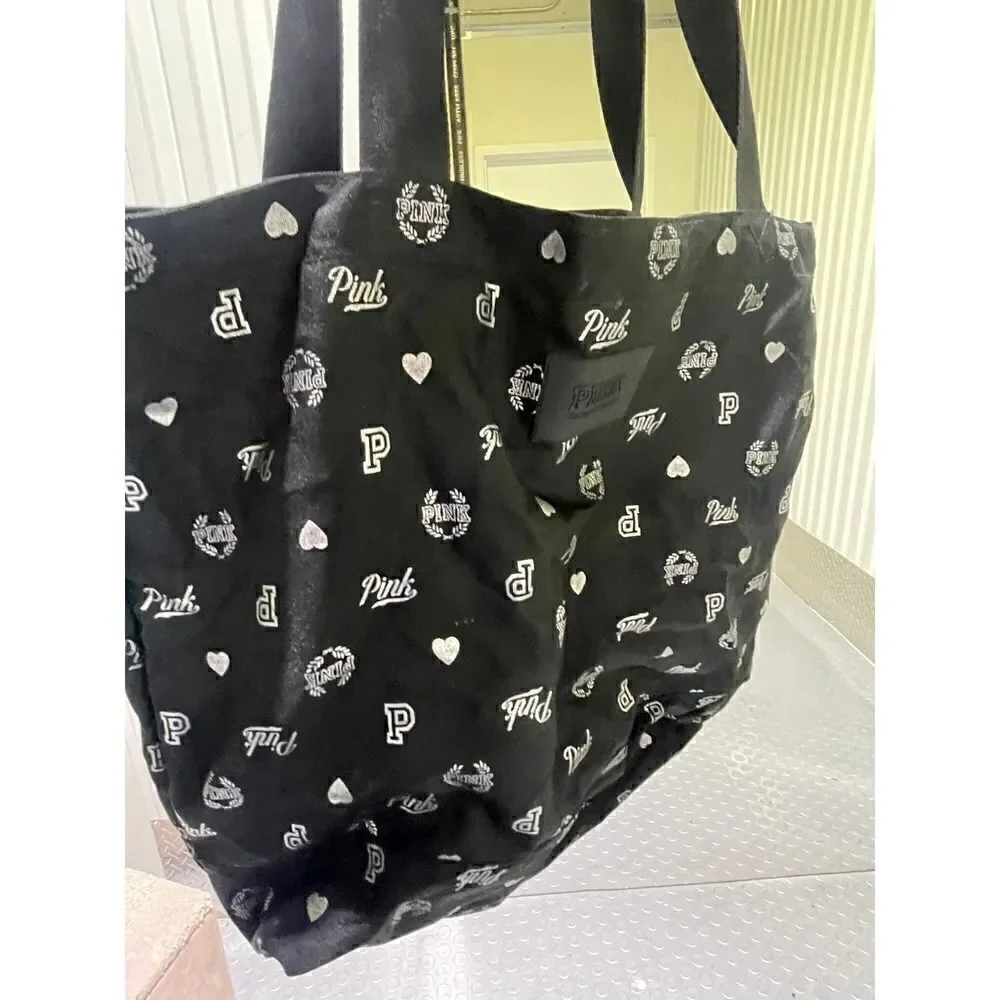 Vintage multi logo black weekender tote bag vs pink